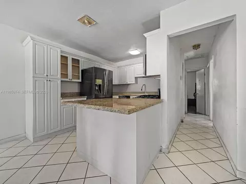 Kitchen - 655 W 70th Pl, Hialeah, FL 33014 photo 2 of 4