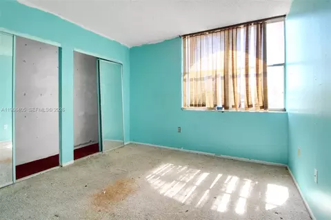 Bedroom - 1115 W 38th Ter #50, Hialeah, FL 33012 photo 5 of 6