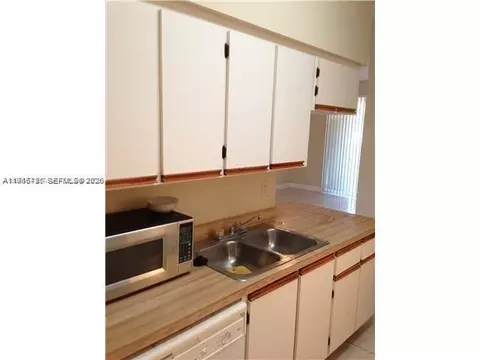 Kitchen - 18330 NW 68th Ave #A, Hialeah, FL 33015 photo 1 of 1
