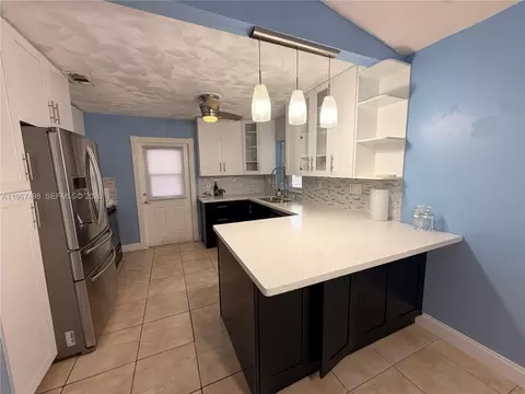 Kitchen - 6080 NW 199th St, Hialeah, FL 33015 photo 1 of 3