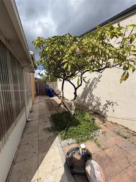 Exterior - 19804 NW 67th Ct, Hialeah, FL 33015 photo 2 of 5