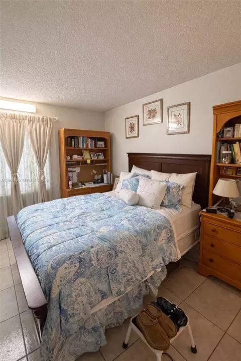 Bedroom - 19804 NW 67th Ct, Hialeah, FL 33015 photo 1 of 2