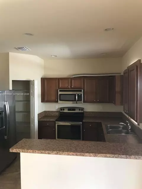Kitchen - 17525 SW 153rd Path, Miami, FL 33187 photo 1 of 2