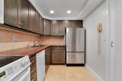 Kitchen - 145 SE 25th Rd #602, Miami, FL 33129 photo 2 of 2