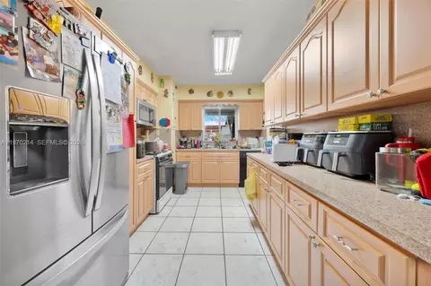Kitchen - 590 W 35th Pl, Hialeah, FL 33012 photo 1 of 1