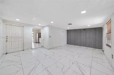 Living - 840 E 17th St, Hialeah, FL 33010 photo 3 of 4