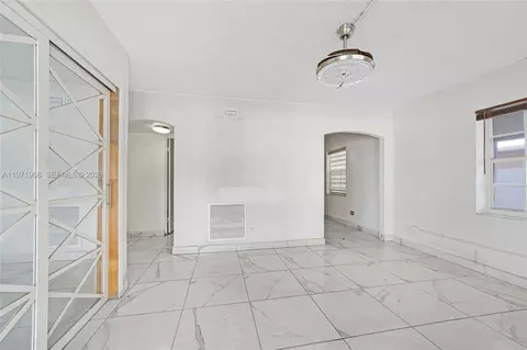 Living - 840 E 17th St, Hialeah, FL 33010 photo 2 of 4