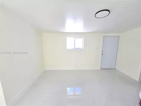 Living - 571 E 54th St, Hialeah, FL 33013 photo 5 of 5