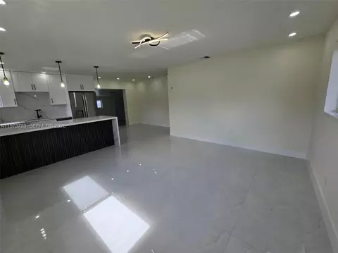 Living - 571 E 54th St, Hialeah, FL 33013 photo 2 of 5