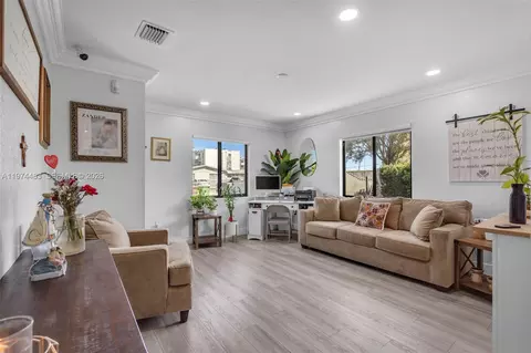 Living - 42 W 44th St, Hialeah, FL 33012 photo 1 of 2