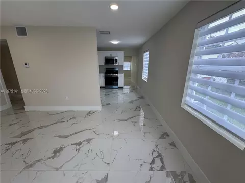 Living - 6324 E 6th Ave, Hialeah, FL 33013 photo 4 of 8