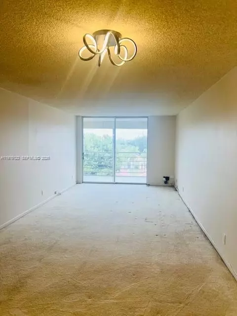 Living - 3251 Holiday Springs Blvd #403, Margate, FL 33063 photo 2 of 2