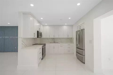 Kitchen - 5635 W 13th Ct, Hialeah, FL 33012 photo 1 of 4