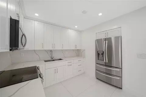 Kitchen - 5635 W 13th Ct, Hialeah, FL 33012 photo 3 of 4