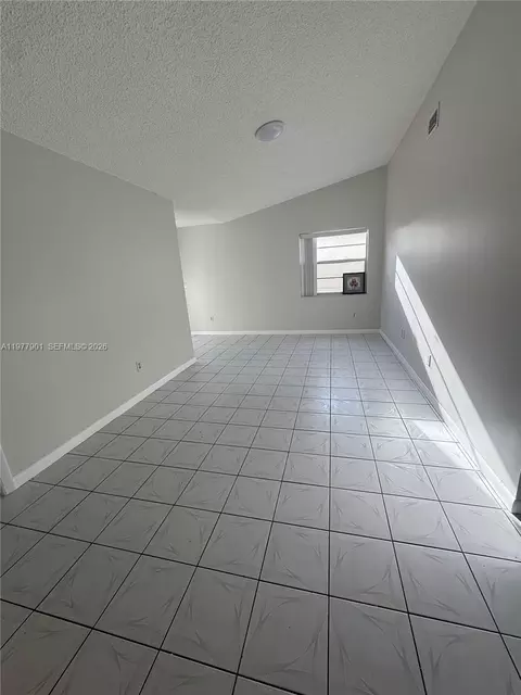 Living - 2566 W 73rd Pl, Hialeah, FL 33016 photo 3 of 5