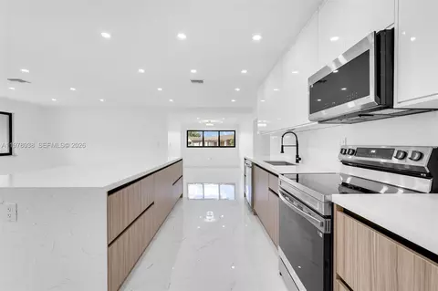 Kitchen - 695 W 73 Pl, Hialeah, FL 33014 photo 4 of 4