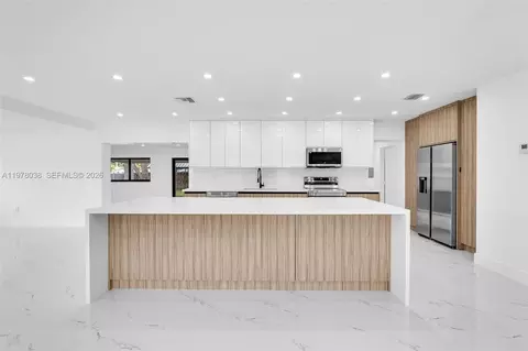 Kitchen - 695 W 73 Pl, Hialeah, FL 33014 photo 1 of 4