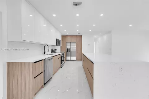 Kitchen - 695 W 73 Pl, Hialeah, FL 33014 photo 3 of 4