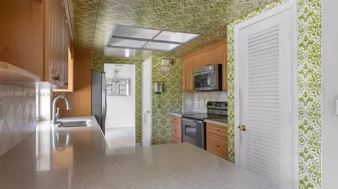 Kitchen - 14435 Tabebuia Ln, Miami Lakes, FL 33014 photo 1 of 2