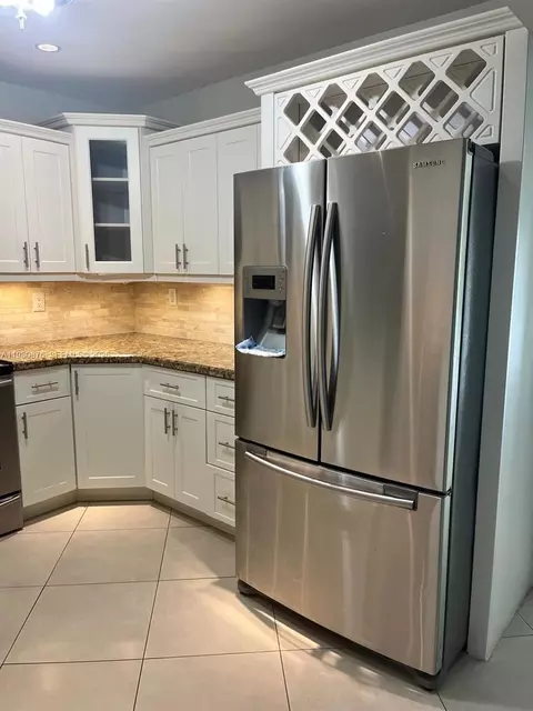 Kitchen - 685 W 77th St, Hialeah, FL 33014 photo 2 of 2