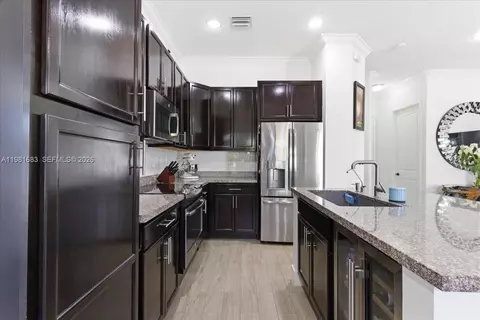 Kitchen - 3407 W 99th Pl, Hialeah, FL 33018 photo 4 of 5