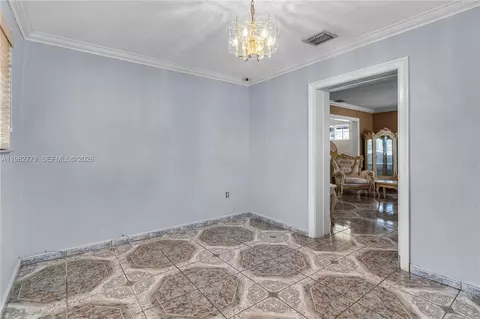 Living - 380 E 56th St, Hialeah, FL 33013 photo 2 of 2