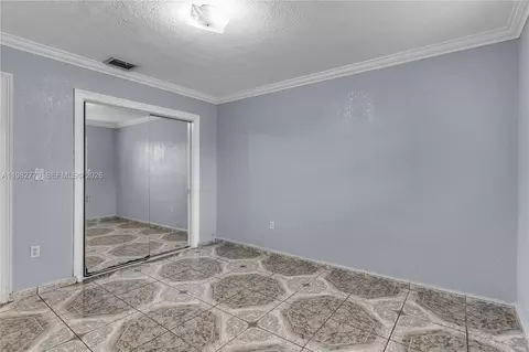 Bedroom - 380 E 56th St, Hialeah, FL 33013 photo 2 of 3