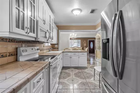 Kitchen - 380 E 56th St, Hialeah, FL 33013 photo 1 of 1