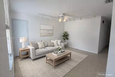Living - 250 E 60th St, Hialeah, FL 33013 photo 3 of 4