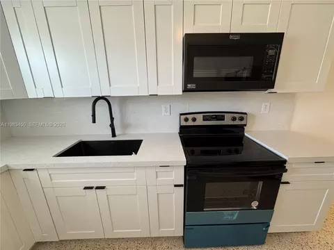 Kitchen - 20 W 37th St, Hialeah, FL 33012 photo 2 of 5