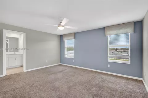 Bedroom - 5610 SEdgewater Cir, Stuart, FL 34997 photo 4 of 9