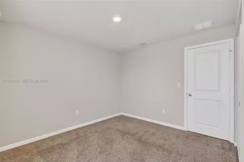 Bedroom - 5610 SEdgewater Cir, Stuart, FL 34997 photo 9 of 9