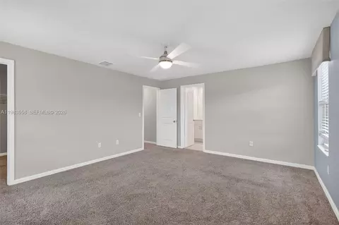 Bedroom - 5610 SEdgewater Cir, Stuart, FL 34997 photo 3 of 9