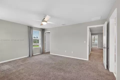 Bedroom - 5610 SEdgewater Cir, Stuart, FL 34997 photo 2 of 9