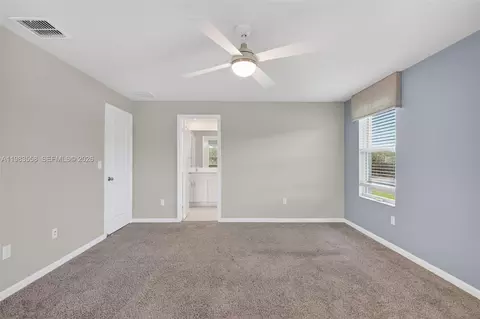 Bedroom - 5610 SEdgewater Cir, Stuart, FL 34997 photo 5 of 9