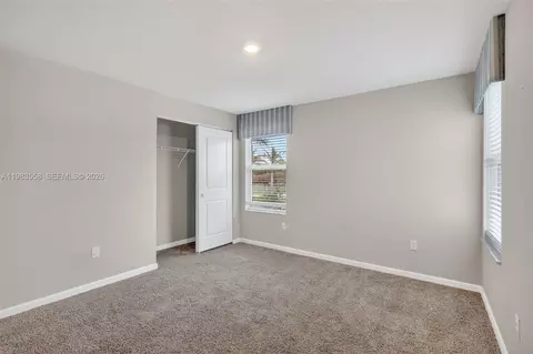 Bedroom - 5610 SEdgewater Cir, Stuart, FL 34997 photo 6 of 9