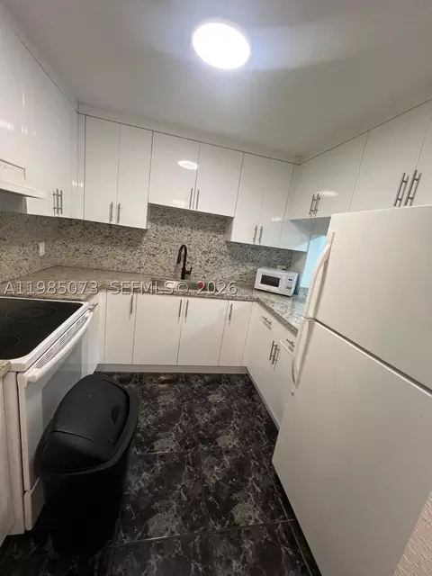 Kitchen - 1900 W 68th St #D207, Hialeah, FL 33014 photo 3 of 4