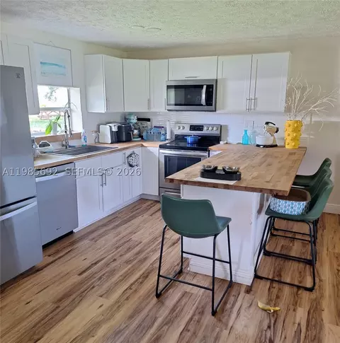 Kitchen - 5525 SE Ault Ave, Stuart, FL 34997 photo 2 of 2