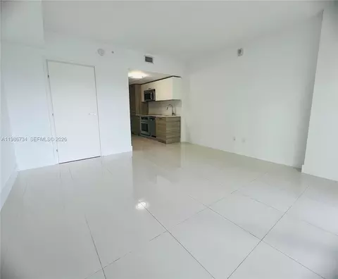 Living - 1300 Brickell Bay Dr #1606, Miami, FL 33131 photo 3 of 7