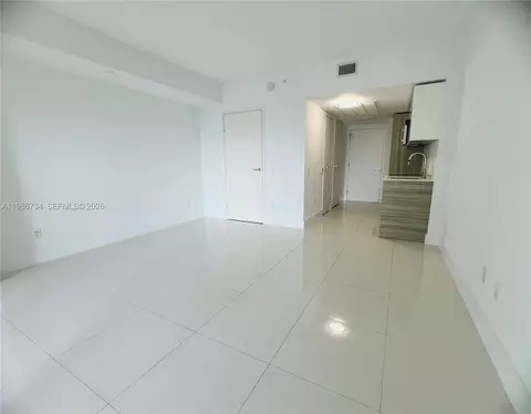 Living - 1300 Brickell Bay Dr #1606, Miami, FL 33131 photo 4 of 7