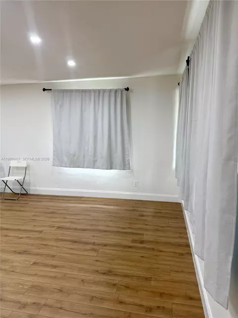 Living - 11201 NE 3rd Ave, Miami, FL 33161 photo 2 of 8