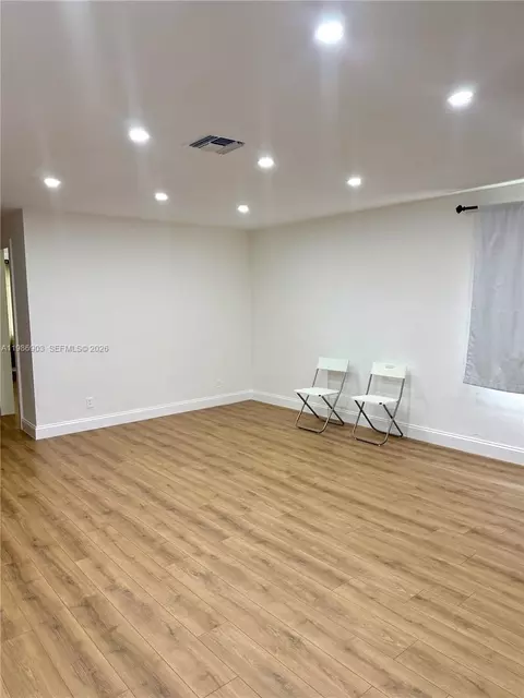 Living - 11201 NE 3rd Ave, Miami, FL 33161 photo 3 of 8