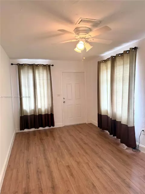 Living - 11201 NE 3rd Ave, Miami, FL 33161 photo 5 of 8