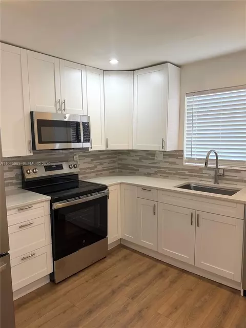 Kitchen - 11201 NE 3rd Ave, Miami, FL 33161 photo 2 of 2