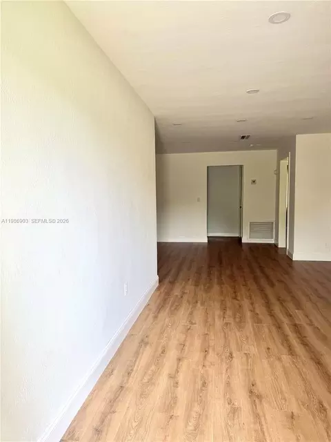 Living - 11201 NE 3rd Ave, Miami, FL 33161 photo 1 of 8