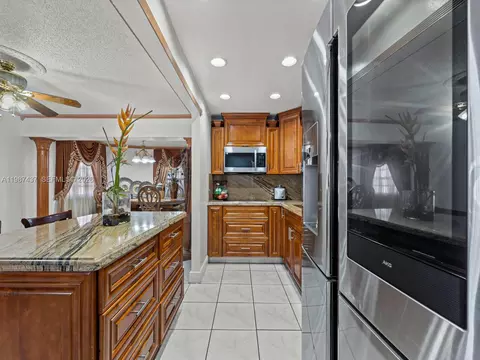 Kitchen - 871 SE 5th Pl, Hialeah, FL 33010 photo 2 of 3