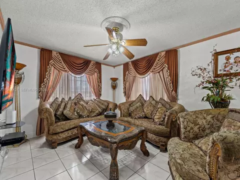 Living - 871 SE 5th Pl, Hialeah, FL 33010 photo 1 of 2