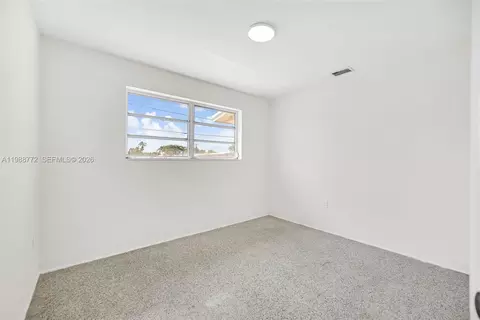 Bedroom - 6325 W 12th Ave, Hialeah, FL 33012 photo 10 of 12