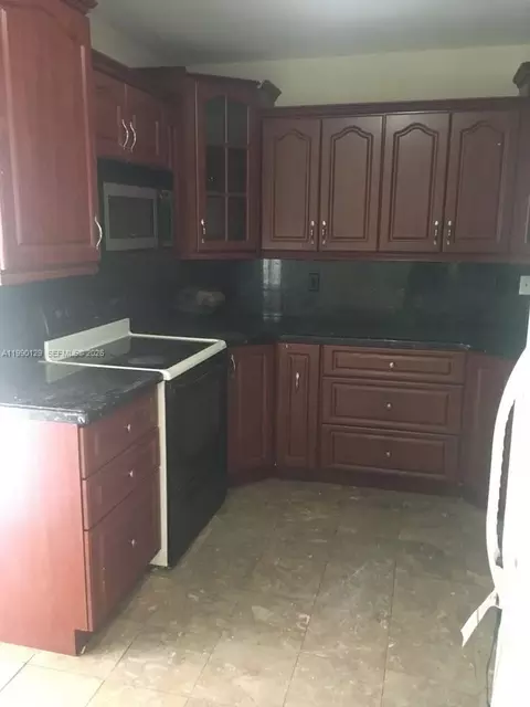 Kitchen - 625 E 8th Ct, Hialeah, FL 33010 photo 1 of 2
