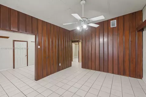 Living - 272 W 46th St, Hialeah, FL 33012 photo 2 of 2